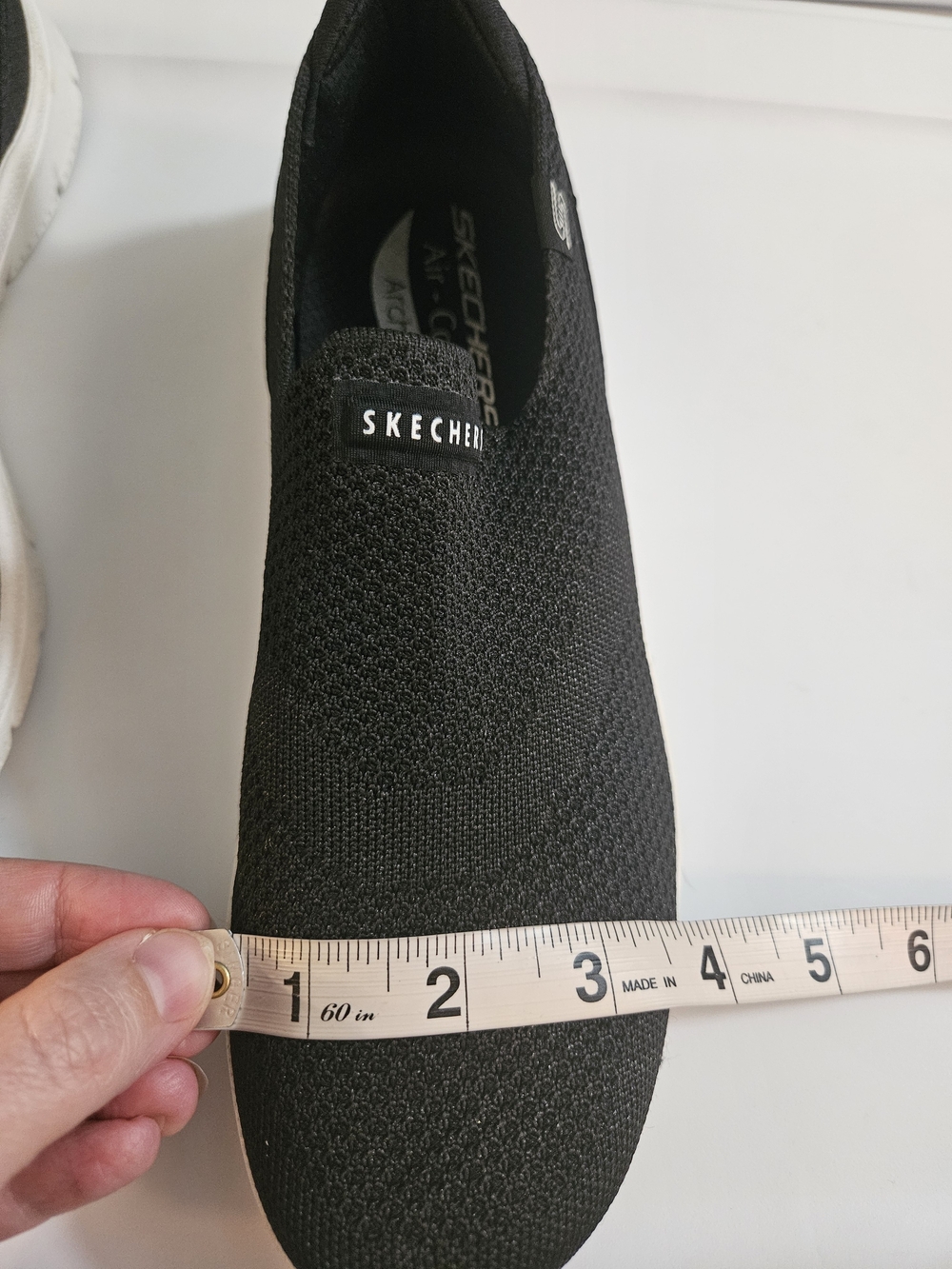 Skechers Black Slip-On Knit Sneakers with White Sole - Picture 10 of 10